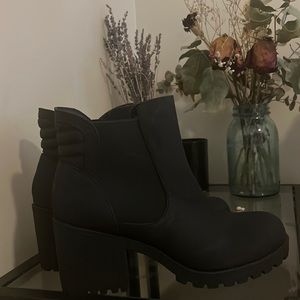 Brand new black heeled boots
